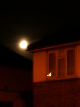 Untitled (moon over rooftops). Click to see next image.